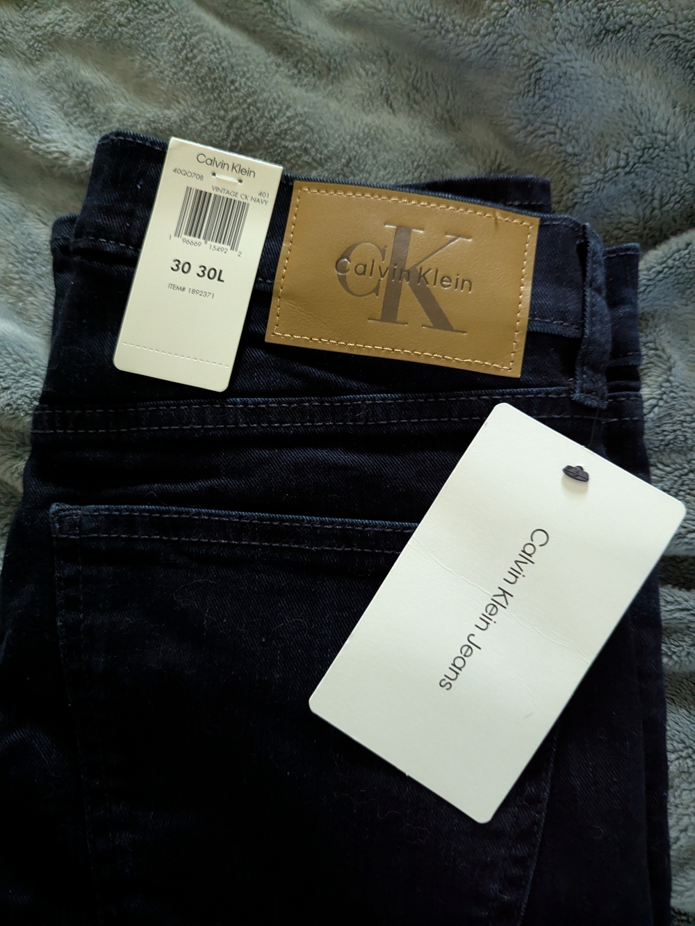 Calvin Klein Women’s Dark Blue Straight Leg Jeans with Tan Patch